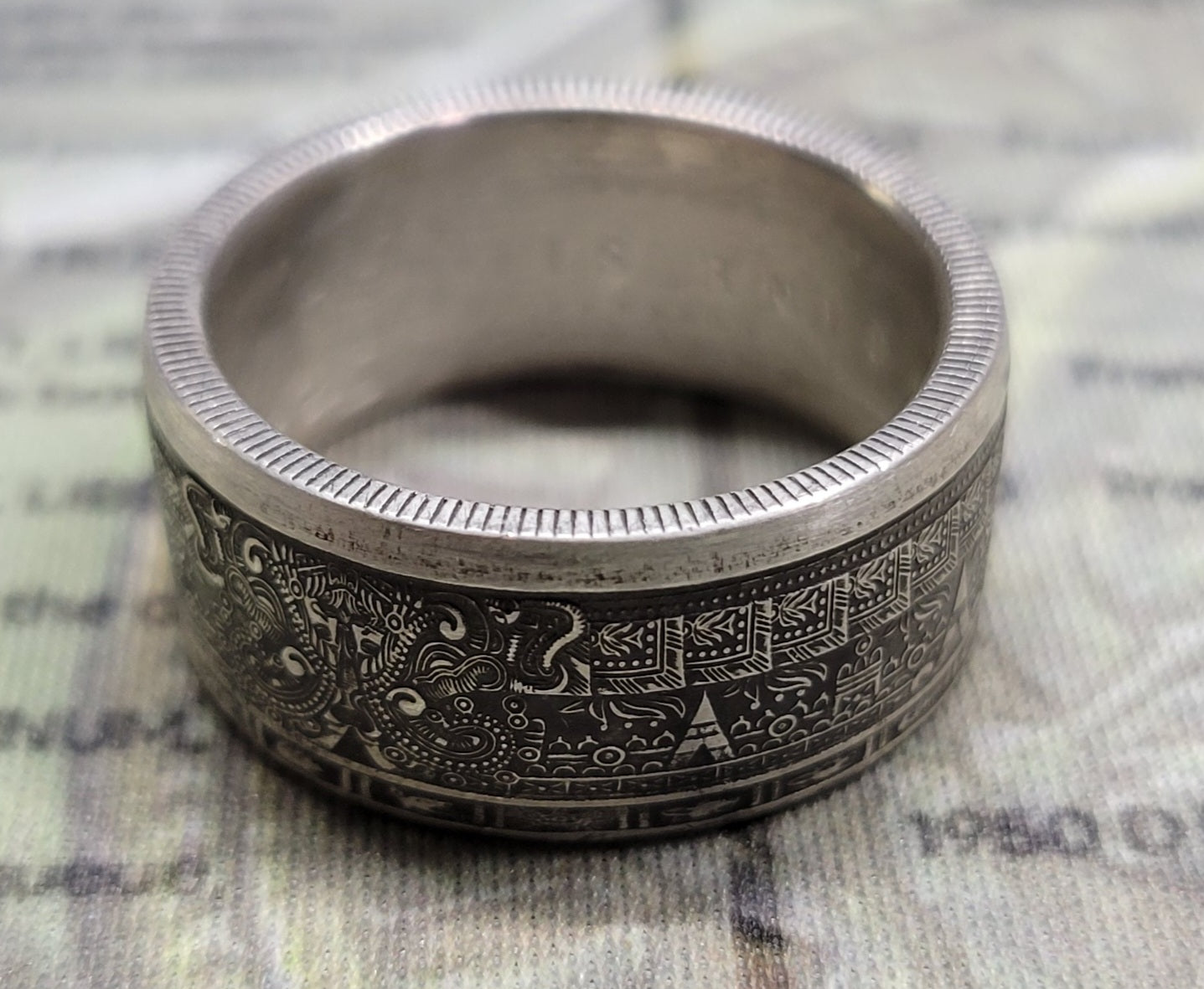 Large Aztec calendar coin ring