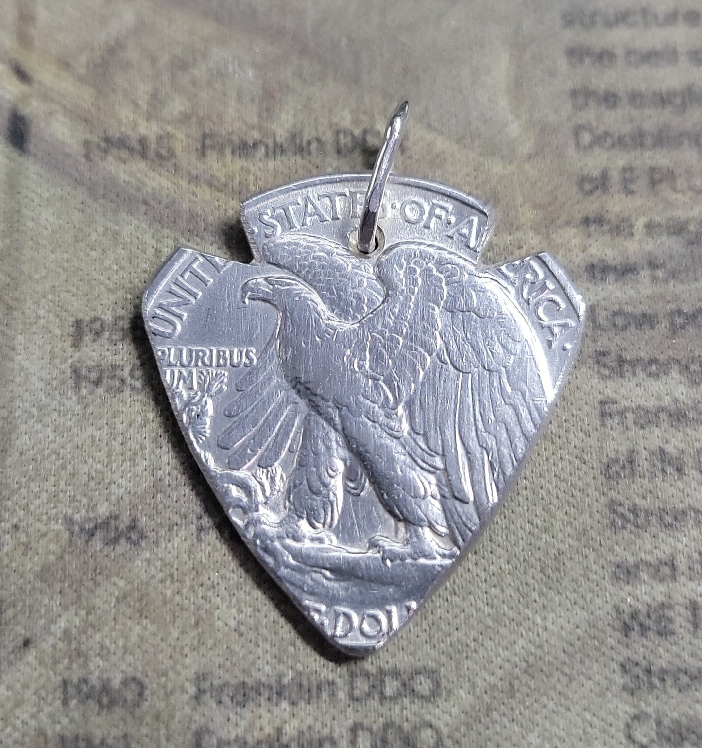 Random date Walking Liberty half dollar arrowhead pendant