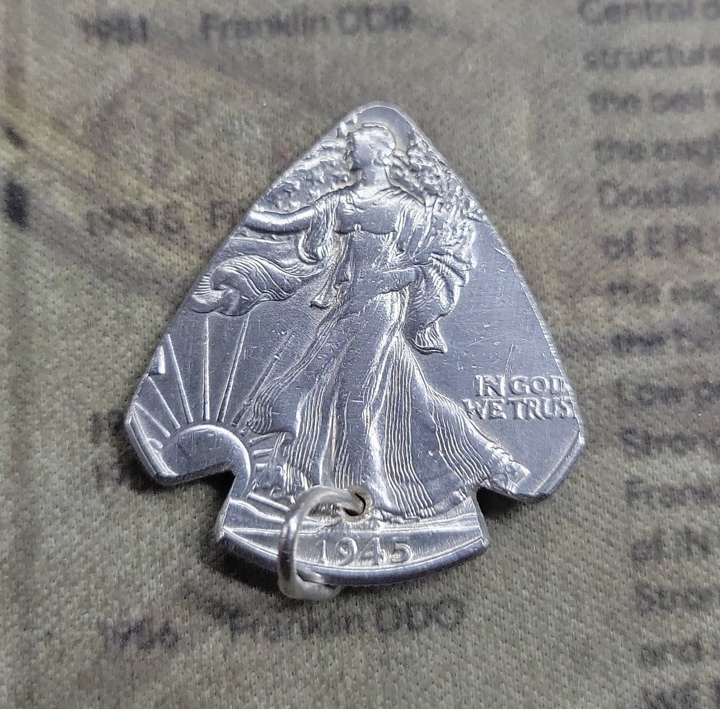 Random date Walking Liberty half dollar arrowhead pendant